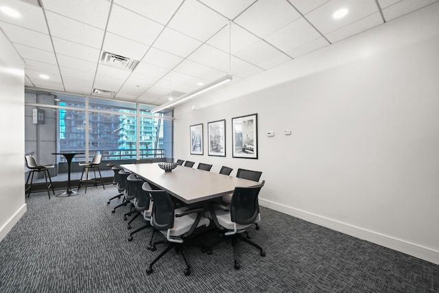 333 N Canal St Unit 2201, Chicago, IL 60606 - dining room featuring expansive windows, dark carpet, and a paneled ceiling