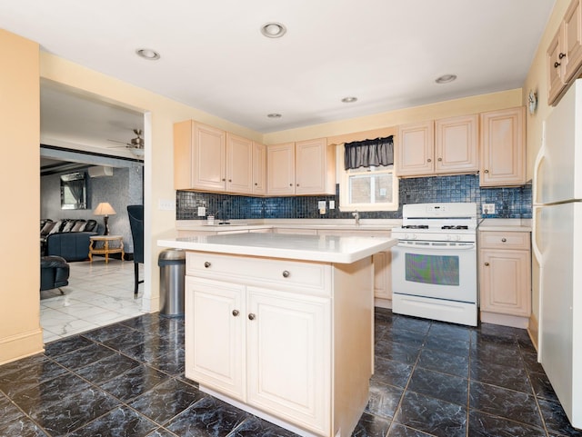 5803 N Kolmar Ave, Chicago, IL 60646 - kitchen with white appliances, light countertops, a center island, decorative backsplash, and a ceiling fan