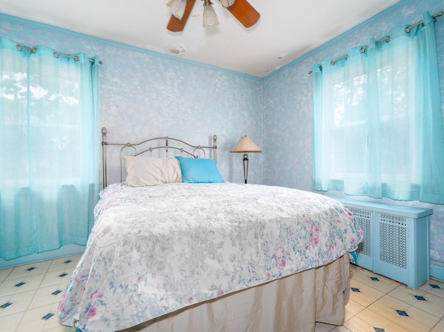 5803 N Kolmar Ave, Chicago, IL 60646 - bedroom featuring radiator, wallpapered walls, ornamental molding, and ceiling fan