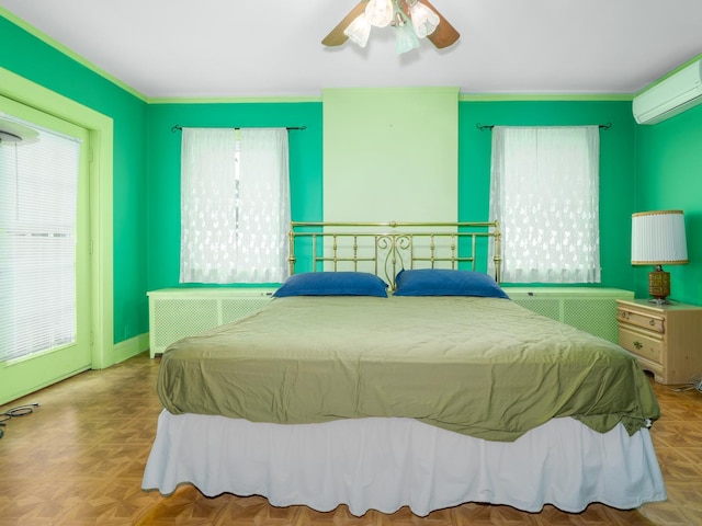 5803 N Kolmar Ave, Chicago, IL 60646 - bedroom with multiple windows, radiator heating unit, and ceiling fan