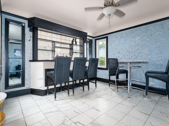 5803 N Kolmar Ave, Chicago, IL 60646 - dining room with marble finish floors, a ceiling fan, and ornamental molding