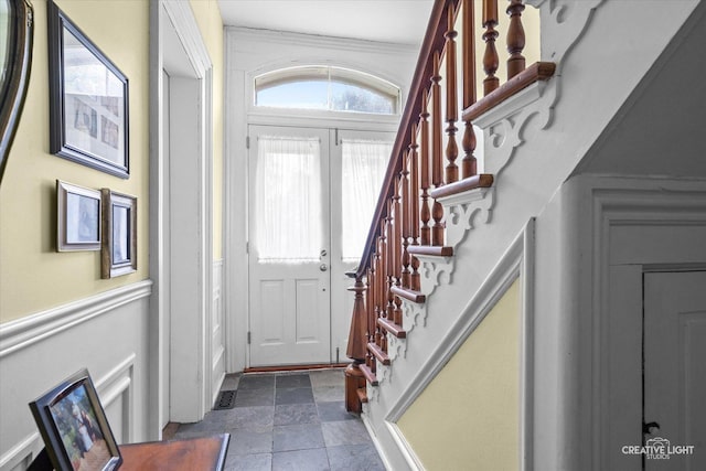 730 E Main St, Amboy, IL 61310 - foyer entrance featuring stairway and dark stone finish flooring
