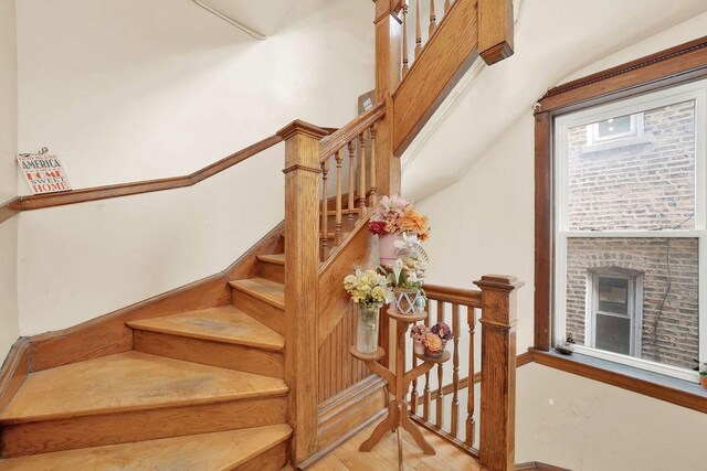 2655 S Millard Ave, Chicago, IL 60623 - stairway featuring wood finished floors and lofted ceiling