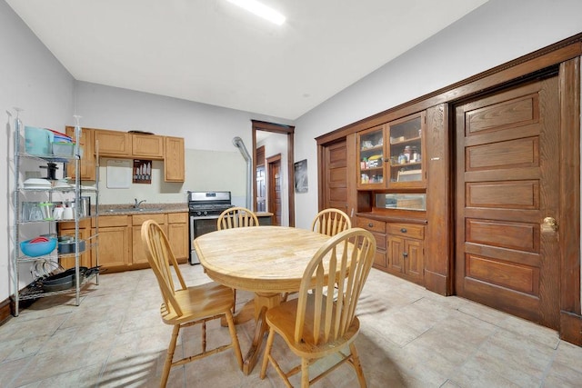 2655 S Millard Ave, Chicago, IL 60623 - dining area featuring light stone finish floors
