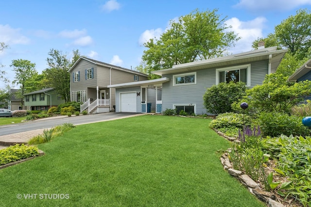 5720 Dunham Rd, Downers Grove, IL 60516 - view of front of home with a front yard, a garage, driveway, and a chimney