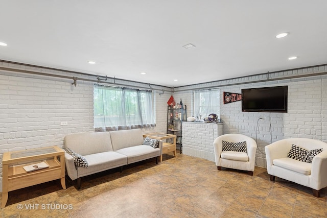 5720 Dunham Rd, Downers Grove, IL 60516 - living room featuring brick wall and recessed lighting