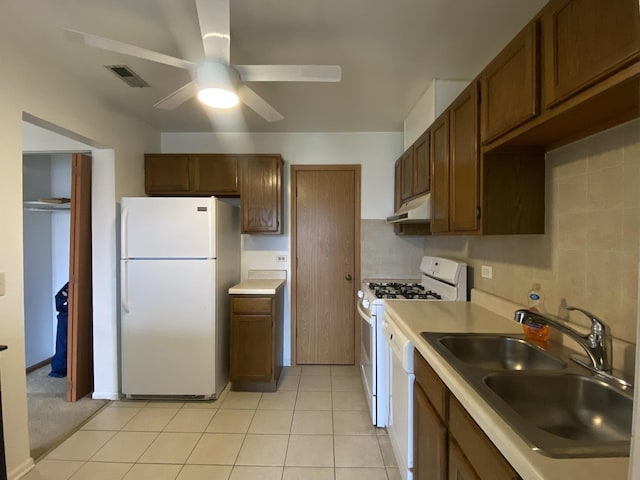 1219 Williamsport Dr Unit 28-3, Westmont, IL 60559 - kitchen featuring white appliances, under cabinet range hood, a sink, ceiling fan, and light countertops