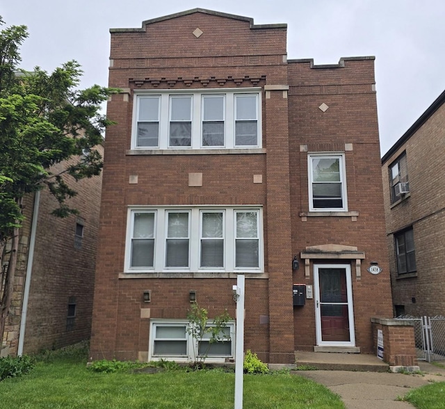 1438 Maple Ave, Berwyn, IL 60402 - view of front of home with brick siding and cooling unit
