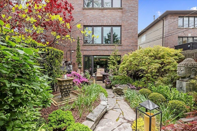 1162 W Farwell Ave, Chicago, IL 60626 - back of house featuring brick siding