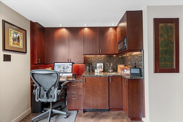1162 W Farwell Ave, Chicago, IL 60626 - office area with baseboards, wood finished floors, recessed lighting, and a sink