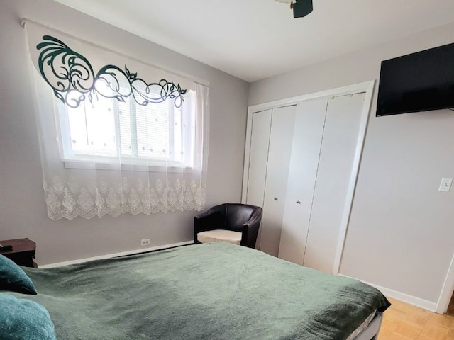 1509 Brown St Unit 11E, Des Plaines, IL 60016 - bedroom with a closet, baseboards, and ceiling fan