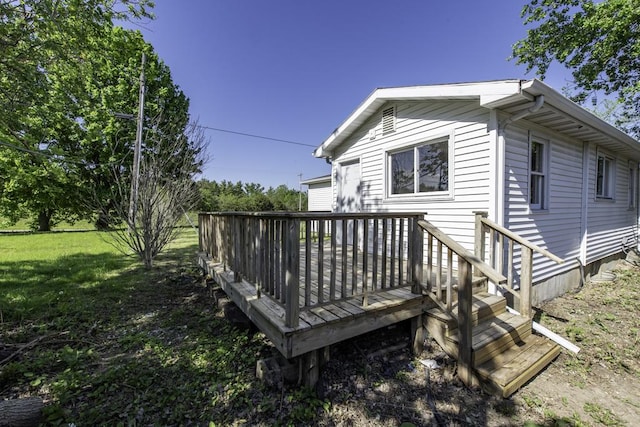 6008 240th Ave, Paddock Lake, WI 53168 - view of home's exterior with a wooden deck and a lawn