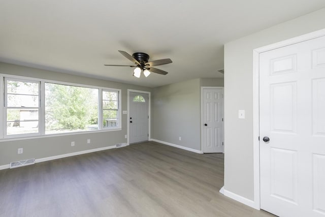 6008 240th Ave, Paddock Lake, WI 53168 - entryway featuring ceiling fan, baseboards, and wood finished floors