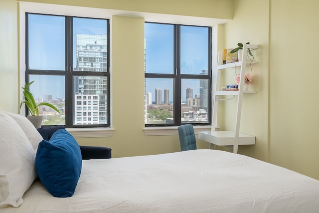bedroom with a skyline view