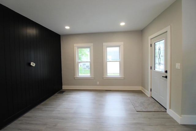 957 E Eagle St, Kankakee, IL 60901 - foyer entrance featuring wood finished floors, baseboards, recessed lighting, and wooden walls