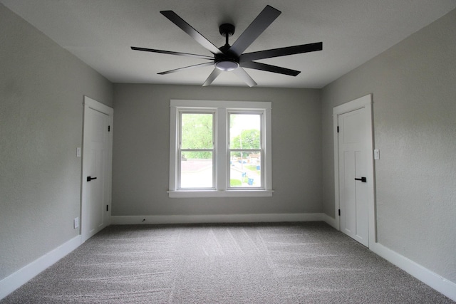 957 E Eagle St, Kankakee, IL 60901 - carpeted empty room with baseboards and ceiling fan
