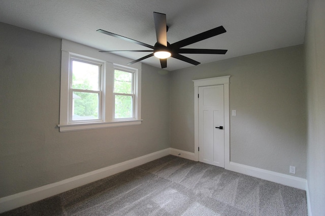 957 E Eagle St, Kankakee, IL 60901 - carpeted empty room with baseboards and ceiling fan