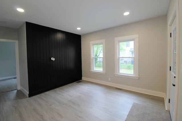 957 E Eagle St, Kankakee, IL 60901 - unfurnished bedroom featuring wood finished floors, recessed lighting, and baseboards