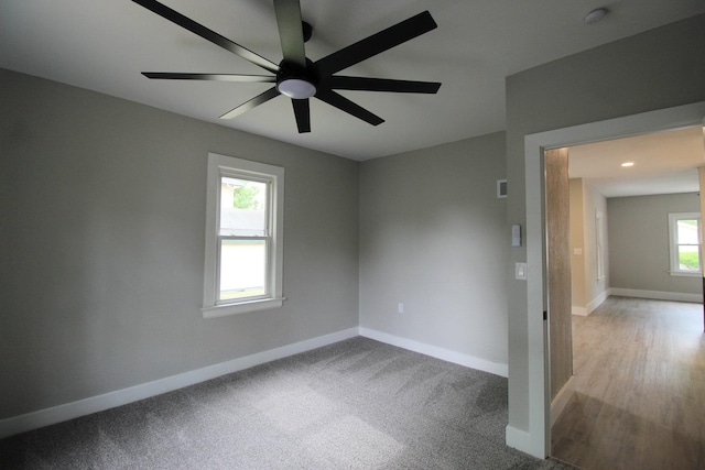 957 E Eagle St, Kankakee, IL 60901 - spare room featuring baseboards, a ceiling fan, and a smoke detector