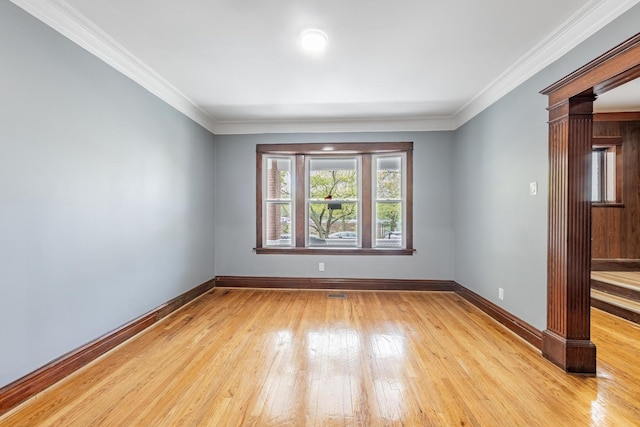 7629 S Green St, Chicago, IL 60620 - empty room featuring light wood-style flooring, baseboards, and ornamental molding