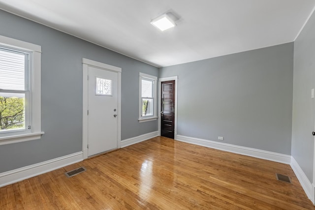 7629 S Green St, Chicago, IL 60620 - foyer featuring healthy amount of natural light, baseboards, and wood finished floors