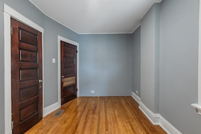 7629 S Green St, Chicago, IL 60620 - entryway with wood finished floors and baseboards