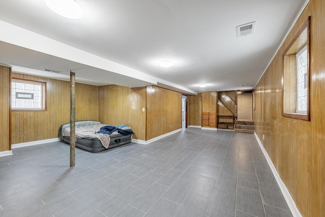 7629 S Green St, Chicago, IL 60620 - below grade area featuring wood walls, stairway, and baseboards