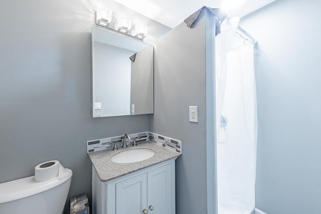 7629 S Green St, Chicago, IL 60620 - bathroom with vanity, toilet, and curtained shower