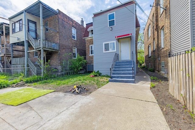 7629 S Green St, Chicago, IL 60620 - back of property with fence and entry steps