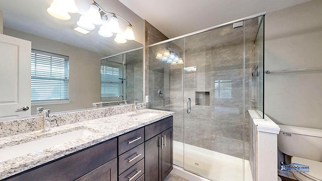 1255 Danforth Ct, Vernon Hills, IL 60061 - bathroom with toilet, double vanity, a stall shower, and a chandelier