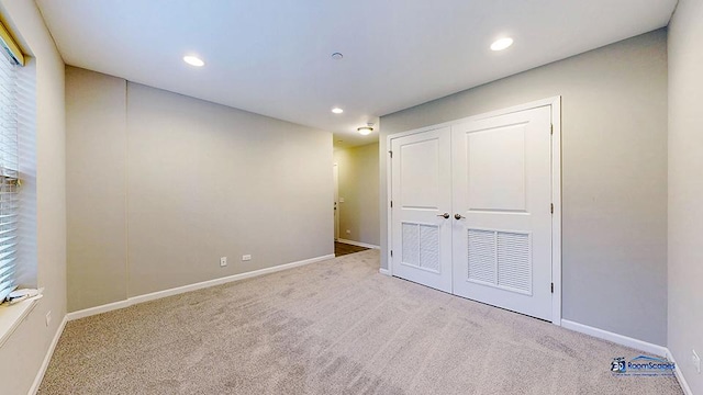 1255 Danforth Ct, Vernon Hills, IL 60061 - unfurnished bedroom with carpet floors, recessed lighting, baseboards, and a closet
