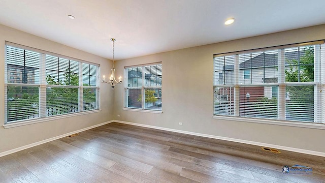 1255 Danforth Ct, Vernon Hills, IL 60061 - unfurnished dining area featuring wood finished floors, baseboards, healthy amount of natural light, and recessed lighting