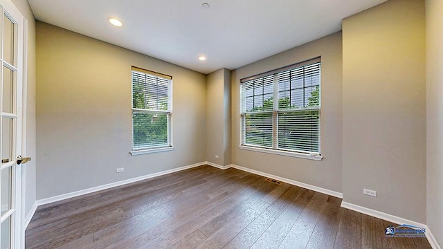 1255 Danforth Ct, Vernon Hills, IL 60061 - unfurnished room with baseboards, dark wood-style floors, and recessed lighting