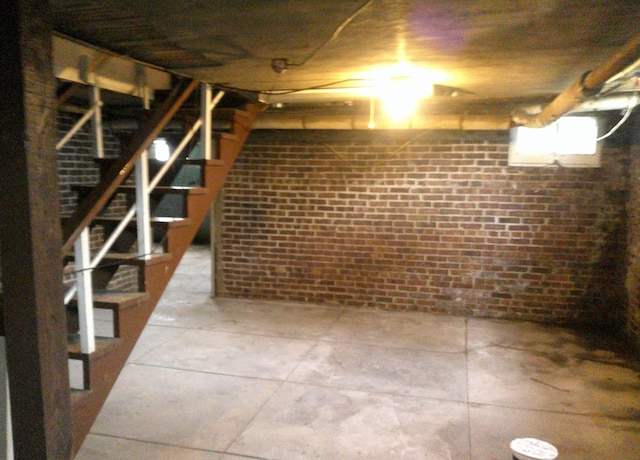 201 E N St, Ridge Farm, IL 61870 - below grade area featuring brick wall and stairway