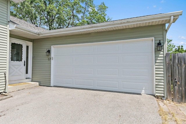 17 Autumn Ln, Streamwood, IL 60107 - garage featuring asphalt driveway