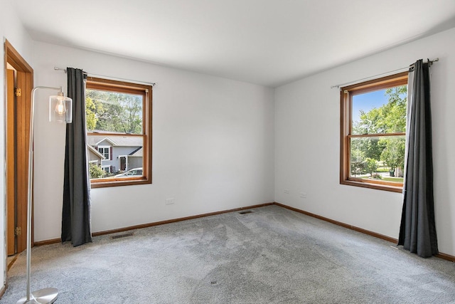 17 Autumn Ln, Streamwood, IL 60107 - carpeted empty room featuring baseboards