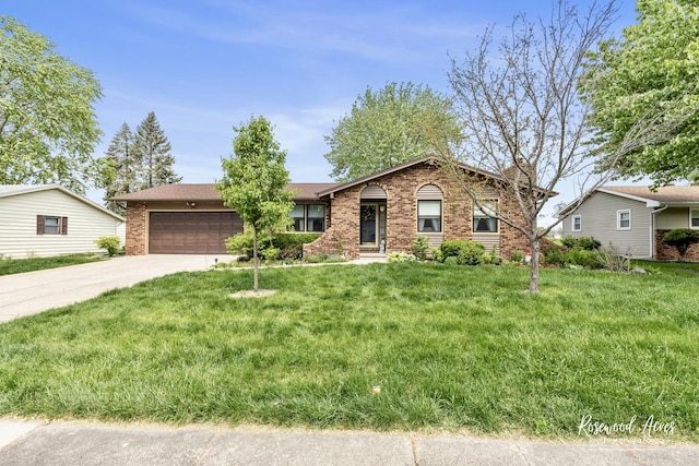 857 Edwin Dr, Bourbonnais, IL 60914 - single story home featuring brick siding, an attached garage, driveway, and a front yard