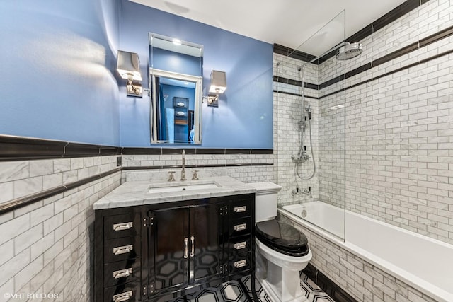 6916 Fieldstone Dr, Burr Ridge, IL 60527 - full bathroom featuring tile walls, toilet, tiled shower / bath combo, and vanity