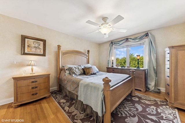 6916 Fieldstone Dr, Burr Ridge, IL 60527 - bedroom with light wood-style floors, baseboards, and a ceiling fan