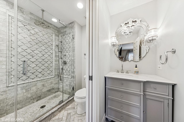 6916 Fieldstone Dr, Burr Ridge, IL 60527 - bathroom with toilet, vanity, a stall shower, and recessed lighting