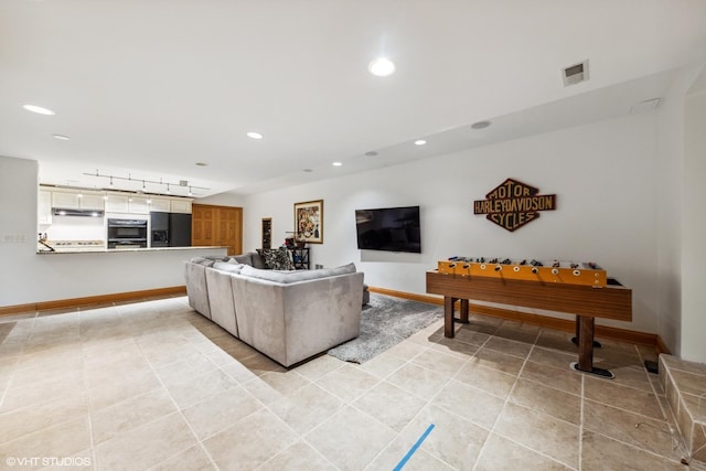 6916 Fieldstone Dr, Burr Ridge, IL 60527 - living room featuring recessed lighting, rail lighting, light tile patterned floors, and baseboards