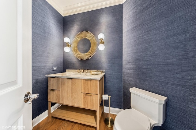 6916 Fieldstone Dr, Burr Ridge, IL 60527 - half bathroom with vanity, baseboards, crown molding, wood finished floors, and wallpapered walls
