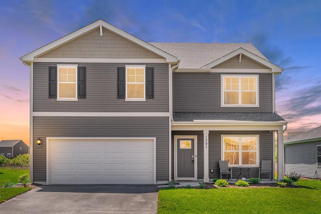 1391 Aspen Ln, Pingree Grove, IL 60140 - view of front of house with covered porch, a front yard, a garage, driveway, and roof with shingles