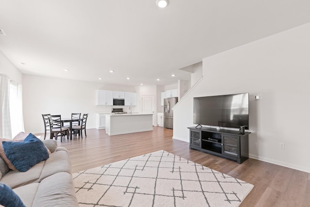 1391 Aspen Ln, Pingree Grove, IL 60140 - living room with light wood-style flooring, recessed lighting, and baseboards