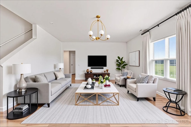 1391 Aspen Ln, Pingree Grove, IL 60140 - living room with light wood-style floors and a chandelier