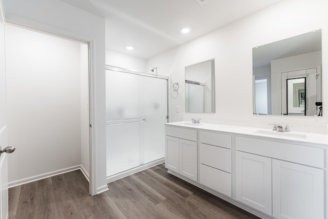 1391 Aspen Ln, Pingree Grove, IL 60140 - full bath with double vanity, a stall shower, wood finished floors, and recessed lighting