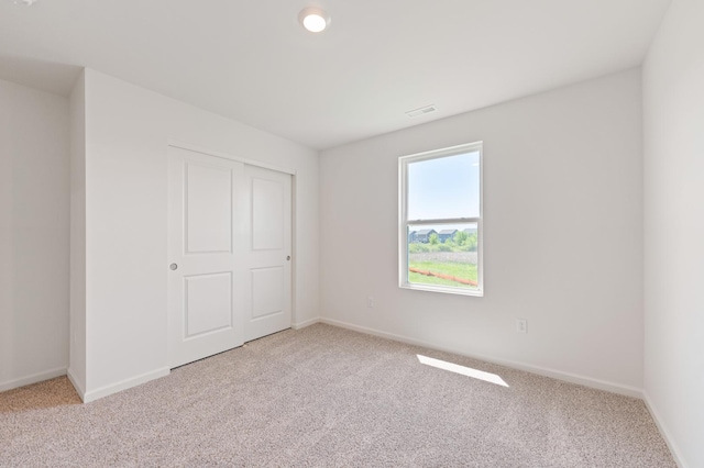 1391 Aspen Ln, Pingree Grove, IL 60140 - unfurnished bedroom with light carpet and baseboards