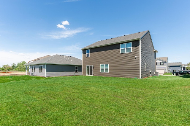 1391 Aspen Ln, Pingree Grove, IL 60140 - rear view of house featuring a lawn and cooling unit