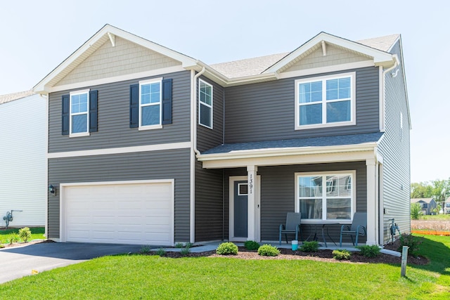 1391 Aspen Ln, Pingree Grove, IL 60140 - view of front of property with a porch, a garage, a front yard, a shingled roof, and asphalt driveway