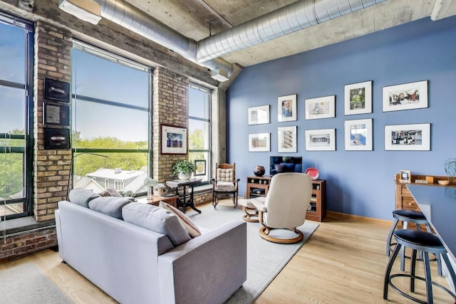 1800 W Roscoe St Unit 432, Chicago, IL 60657 - living room featuring wood finished floors and baseboards